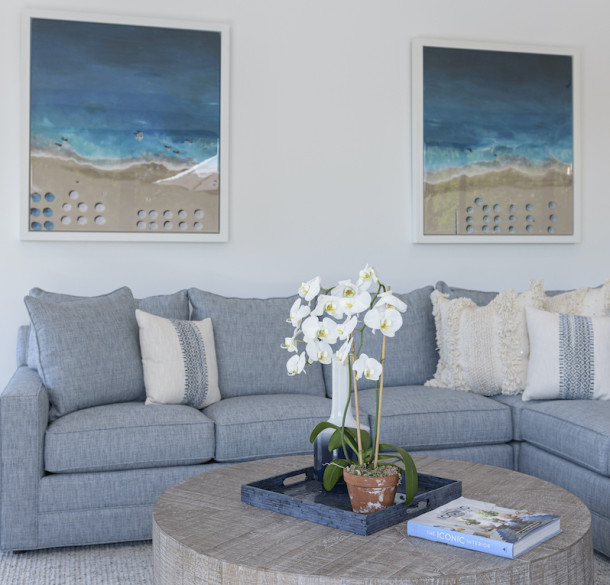 living-room-design-round-coffee-table-blue-couch