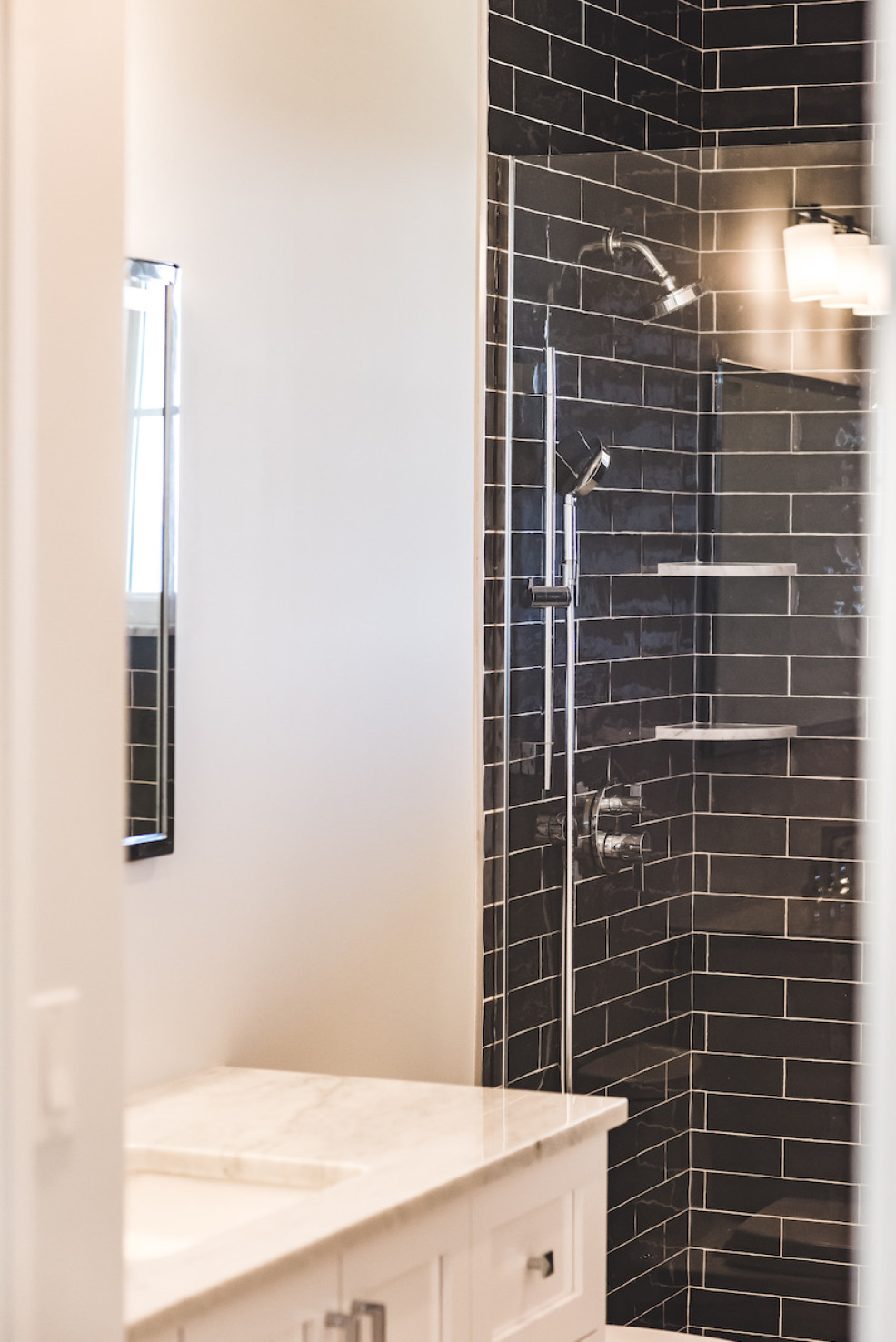 black-subway-tile-shower-design