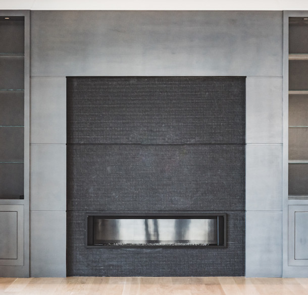 large-fireplace-gray-black-modern-built-in-shelves